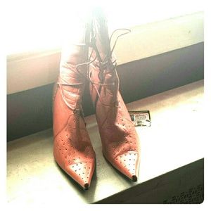 Boots with 3-4inch heels.