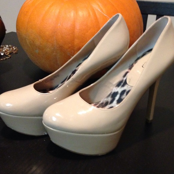 Carlos Santana liquid flesh platform heels