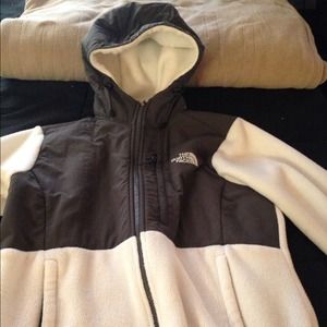 White North Face fleece with a hood.