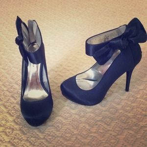 Navy satin pumps worn once for a sweet 16.