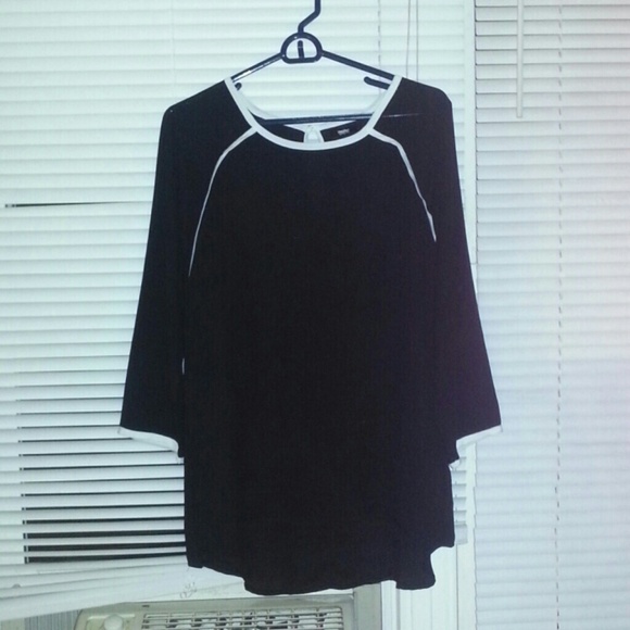 Slightly see thru black with white piping.