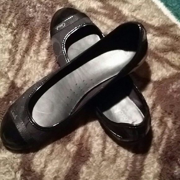 Black coach ballet flats