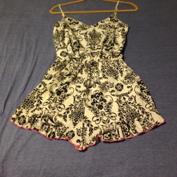 New Romper. Black and white design w/ pink trim