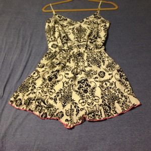 New Romper. Black and white design w/ pink trim
