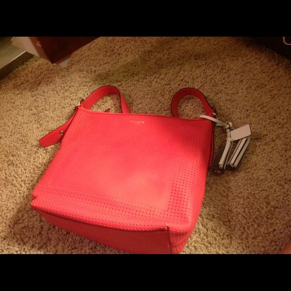 COACH LEGACY Leather large duffle perforated coral