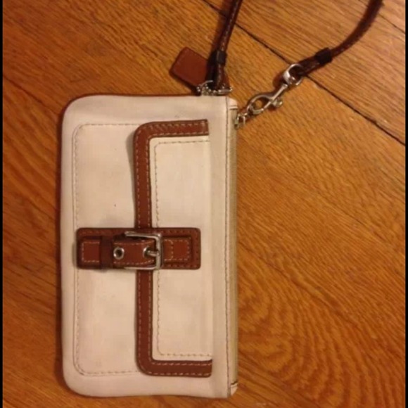 White and brown leather coach clutch