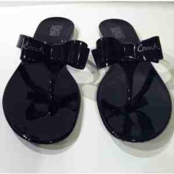 Authentic Coach flip flops with bow black