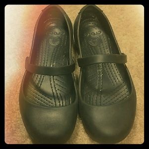 Black Crocs flats