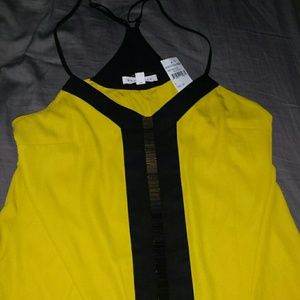 Trendy yellow black a and gold top