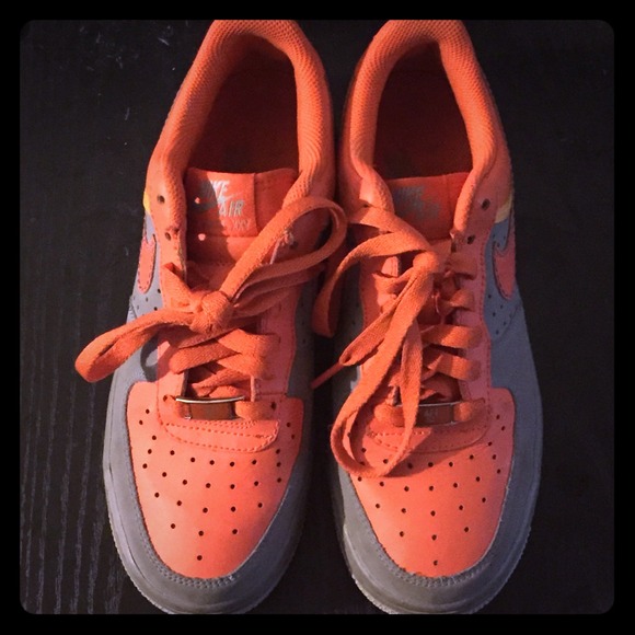 Orange and grey Nike Air Force sneakers