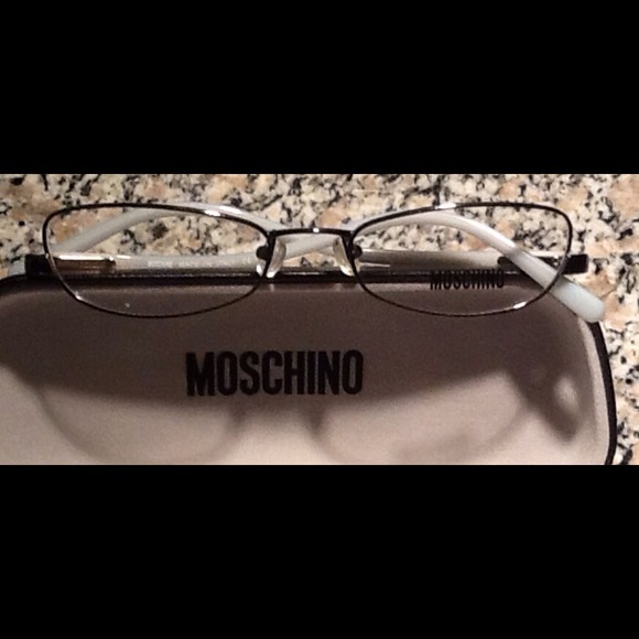 AUTHENTIC MOSCHINO EYEGLASSES WITH AUTHENTIC CASE.