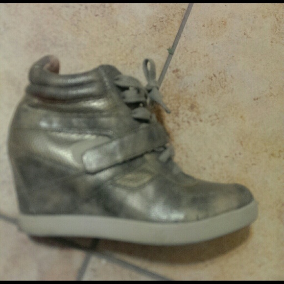Gold high heel shoes