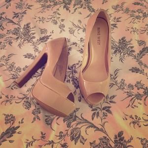 Nine West Peep toe Platform Pumps