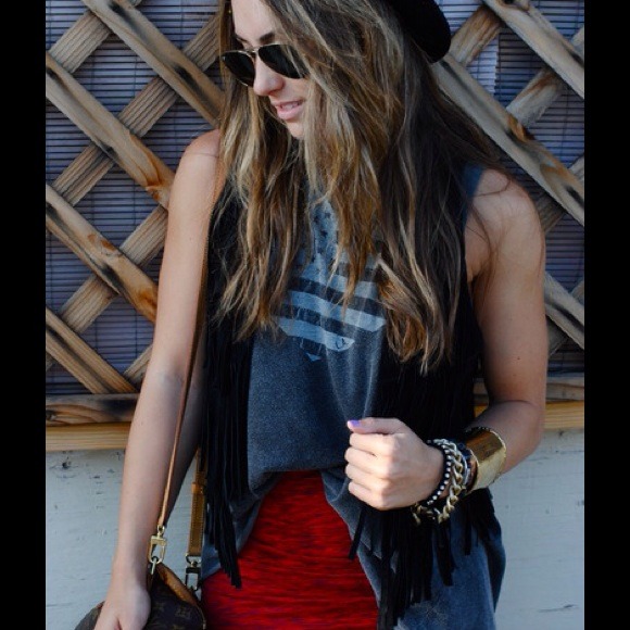 Black fringe vest. 70s trend cute for fall