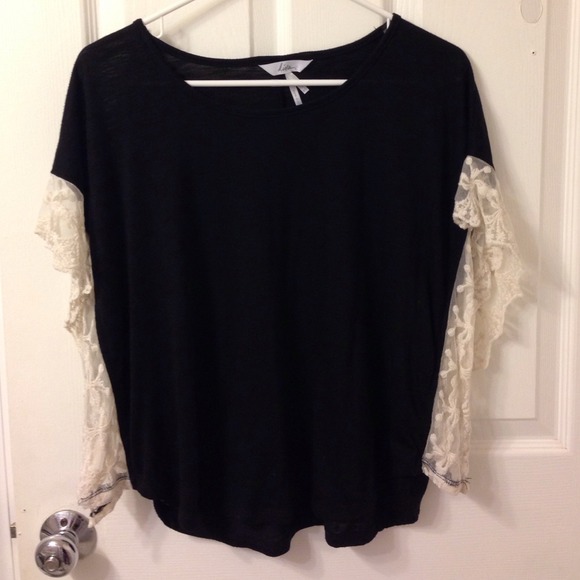 Loose black top with white lace detail