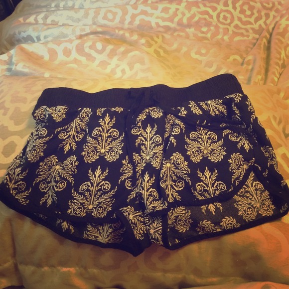 Black with shorts with string. Elastic band.