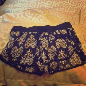 Black with shorts with string. Elastic band.