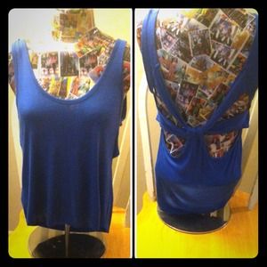 Blue open back loose fitted tank by Decree.