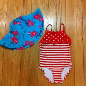 Toddler swimming suit and hat.
