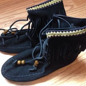 Black suede fringe moccasin boots