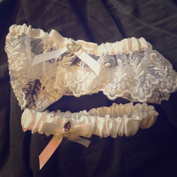 2 wedding garters. Both white