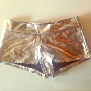Metallic rave shorts.