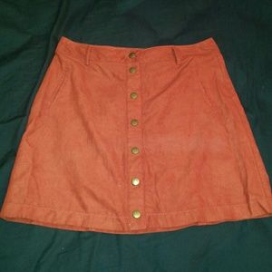 Burnt orange high waisted skirt.