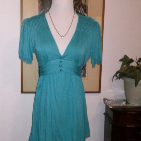 Teal low cut shirt sz medium with tie back - Picture 1 of 2