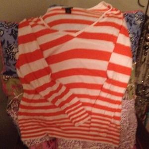 Orange and white striped sweater