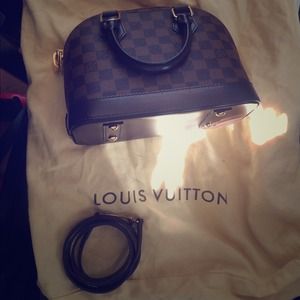 Authentic mint condition Louis Vuitton ALMA Bb.