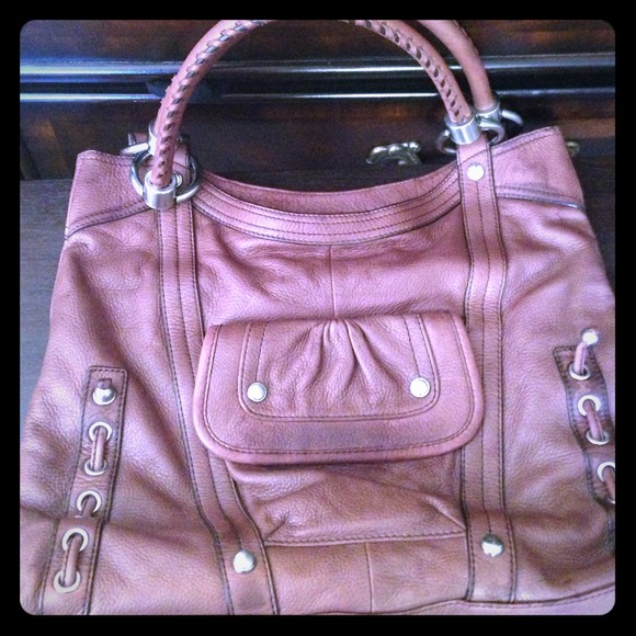 B. Makowsky brown hand bag.