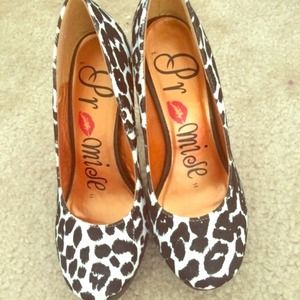 SOLD.  Black and white printed heels