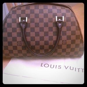 100% Authentic Damier Ebene Canvas Rivera LV
