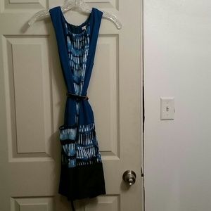 Turquoise, black & white patterned dress.