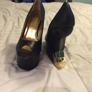 Black Heelies size 11