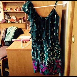 SOLD Pretty patterned dress. Ruffle side detail