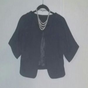 Cute little, short sleeve balarro jacket.