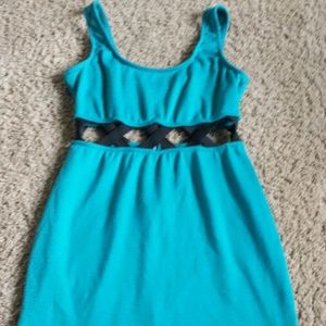Teal dress with cut out in the middle