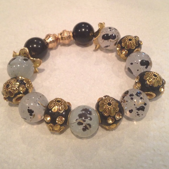 Gold,black,and white HOMEMADE bracelet