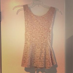 Pale pink floral peplum blouse