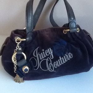 Navy blue juicy couture bag.