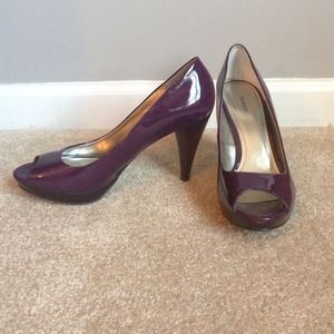 Purple patent peep toe pumps