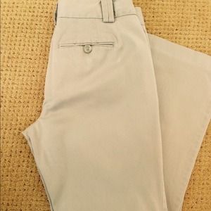 Dove gray cotton twill flare leg pants.