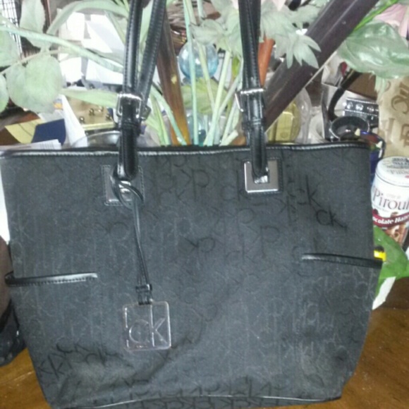 Authentic Calvin Klein signature leather trim