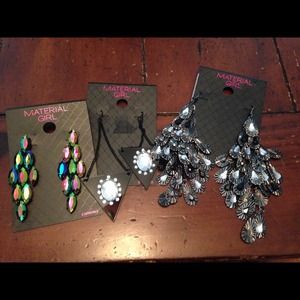 Material girl set of three earrings.