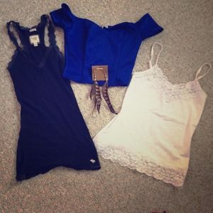 Lot of 3 woman's shirts and 1 pair of earrings