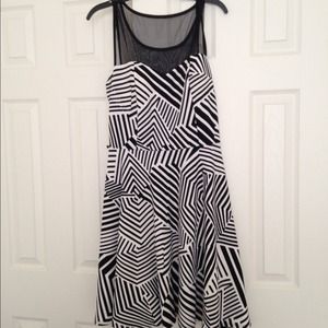 Peplum style abstract dress with mesh detailing