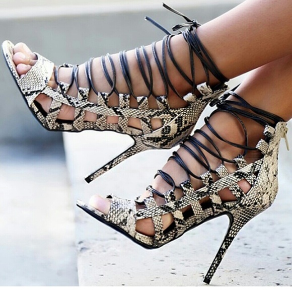Fly jane snakeskin lace up heels