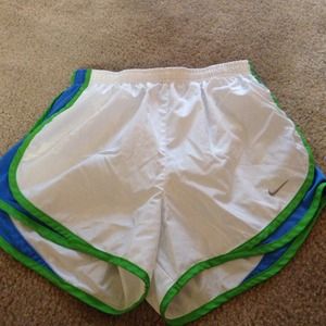 White, green and blue Nike shorts