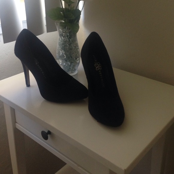 Black suede pumps
